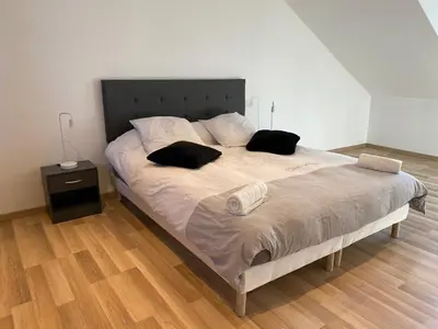 Un ou plusieurs lits dans un hébergement de l'établissement Family Villa 29