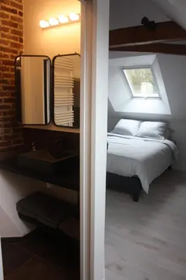 Un ou plusieurs lits dans un hébergement de l'établissement Chambre chez l'habitant Les Aubes du Vexin
