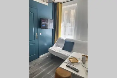 Coin salon dans l'établissement Appart' Studette Cosy - STADE U ARENA