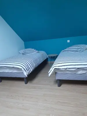 Un ou plusieurs lits dans un hébergement de l'établissement La petite maison