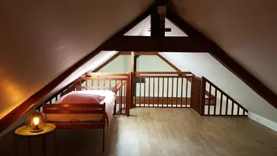 Un ou plusieurs lits dans un hébergement de l'établissement Gîte LA BERGERIE