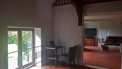 Coin salon dans l'établissement Gîte LA BERGERIE
