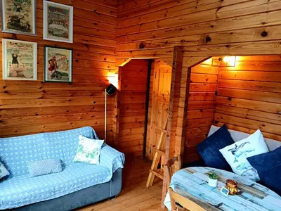Coin salon dans l'établissement Chalet à la campagne