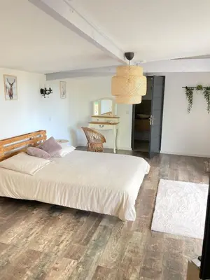 Un ou plusieurs lits dans un hébergement de l'établissement Villa Nymphea