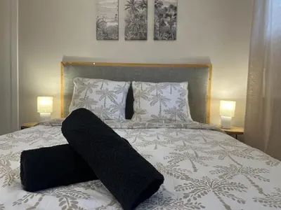 Un ou plusieurs lits dans un hébergement de l'établissement Le Bohème - Appartement proche gare et commerces
