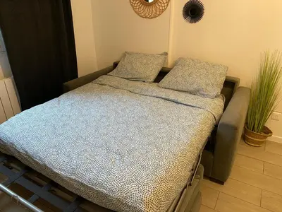 Un ou plusieurs lits dans un hébergement de l'établissement Le Bohème - Appartement proche gare et commerces