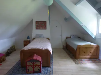 Un ou plusieurs lits dans un hébergement de l'établissement Orfea s home - maison de charme, cheminée et spa, Lyons-la-Forêt