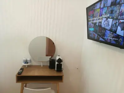 Télévision ou salle de divertissement dans l'établissement Villa Carlotta - Sea resort