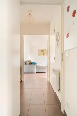 Un ou plusieurs lits dans un hébergement de l'établissement Appartement avec Jardin et Terrasse près de Paris