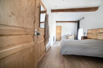 Un ou plusieurs lits dans un hébergement de l'établissement Les Chambres d'hotes de Sophie