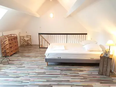 Un ou plusieurs lits dans un hébergement de l'établissement Appartement lumineux à Sainte-Geneviève, 45 m² jardin