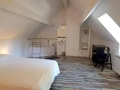 Un ou plusieurs lits dans un hébergement de l'établissement Appartement lumineux à Sainte-Geneviève, 45 m² jardin