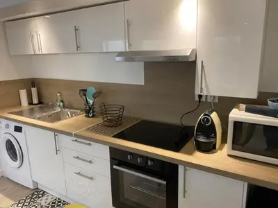 Cuisine ou kitchenette dans l'établissement CosyRouen bouquet parking gratuit