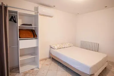 Un ou plusieurs lits dans un hébergement de l'établissement Appartement 3pieces