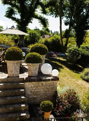 Jardin de l'établissement Hotel Restaurant La Musardiere