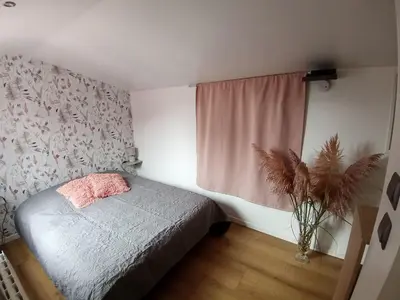 Un ou plusieurs lits dans un hébergement de l'établissement CHARMANTE MAISON PRES DE DIEPPE