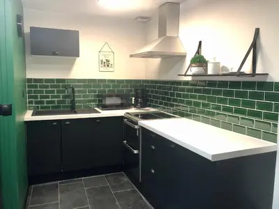 Cuisine ou kitchenette dans l'établissement Le charme et l’original
