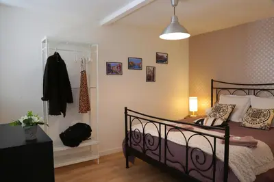 Un ou plusieurs lits dans un hébergement de l'établissement Superbe appartement tout confort 