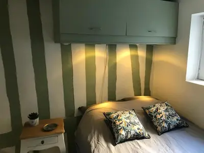 Un ou plusieurs lits dans un hébergement de l'établissement Charmant T1 Vieux Rouen