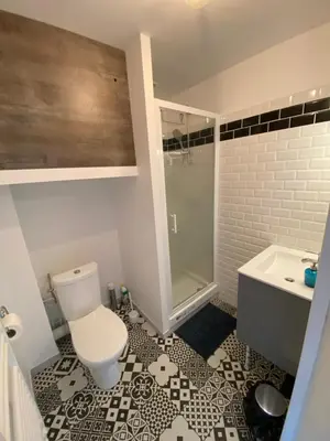 Salle de bains dans l'établissement Appartement vue beffroi