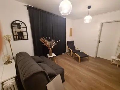 Coin salon dans l'établissement Appartement de vacances a St Pierre du Vauvray