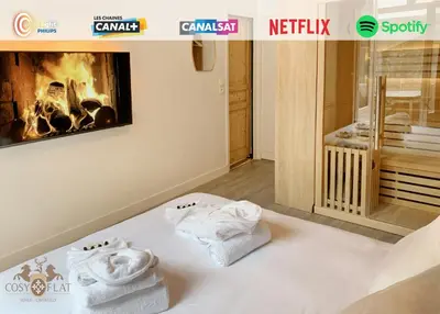 Un ou plusieurs lits dans un hébergement de l'établissement Suite Cosy Flat - Hyper-Centre avec sauna privatif
