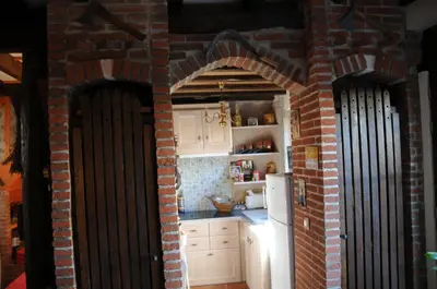 Cuisine ou kitchenette dans l'établissement Gîte Mi Do