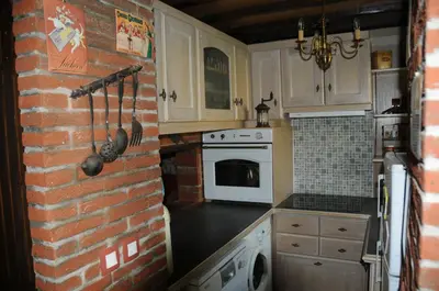 Cuisine ou kitchenette dans l'établissement Gîte Mi Do