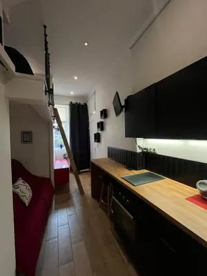 Cuisine ou kitchenette dans l'établissement Studio Louis XIII