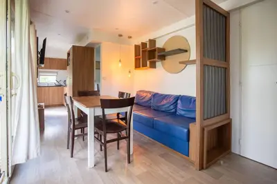 Coin salon dans l'établissement Camping du Château Vert