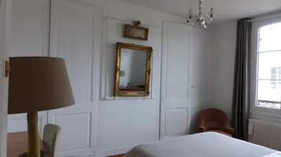Un ou plusieurs lits dans un hébergement de l'établissement Rouen Hyper Centre Cathédrale Hotel de ville