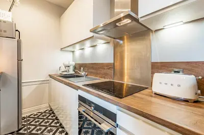Cuisine ou kitchenette dans l'établissement Beaux-arts • 2 chambres 2 SDB • Parking privé