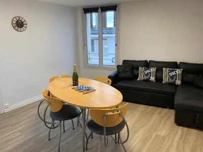 Coin salon dans l'établissement L’Escapade Normande