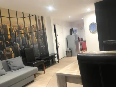 Coin salon dans l'établissement F3 AVEC PARKING ROUEN COTE DOCK76