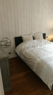 Un ou plusieurs lits dans un hébergement de l'établissement L'escale - Appartement en centre ville
