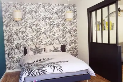 Un ou plusieurs lits dans un hébergement de l'établissement L'oasis : Appartement en centre ville