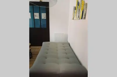 Coin salon dans l'établissement L'oasis : Appartement en centre ville