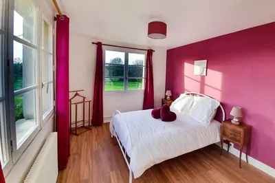 Un ou plusieurs lits dans un hébergement de l'établissement Maison normande au bord de Seine, Le Verger de Pacôme