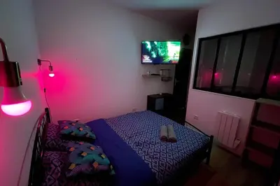 Un ou plusieurs lits dans un hébergement de l'établissement Studio NETFLIX Unique Amiens