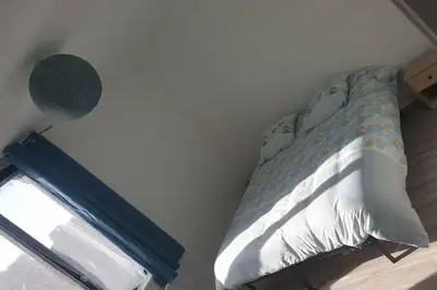 Un ou plusieurs lits dans un hébergement de l'établissement appartement laïs