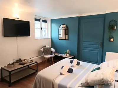 Un ou plusieurs lits dans un hébergement de l'établissement La Vicomté - Quai Henri IV - WIFI gratuit
