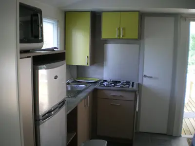 Cuisine ou kitchenette dans l'établissement Aux Cygnes D'Opale