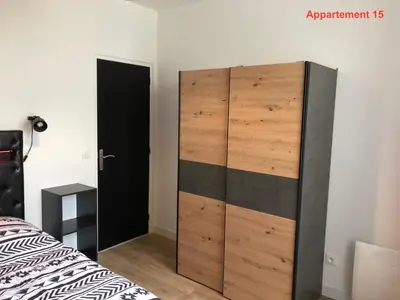 Un ou plusieurs lits dans un hébergement de l'établissement Les appartements du quai