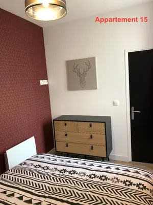Un ou plusieurs lits dans un hébergement de l'établissement Les appartements du quai