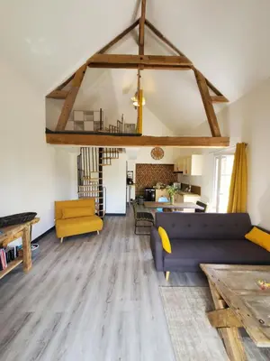 Coin salon dans l'établissement La Suite du Hameau