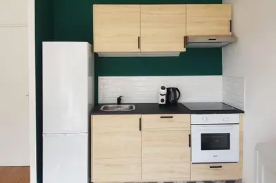 Cuisine ou kitchenette dans l'établissement Le Petit Nicolas