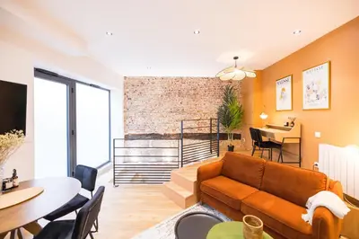 Coin salon dans l'établissement L'Autel La Crypte Mystérieuse de Rouen - sauna & balnéo