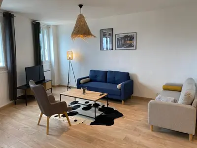 Coin salon dans l'établissement Family Appart 2