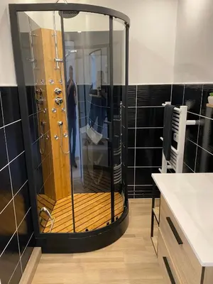 Salle de bains dans l'établissement Family Appart 2