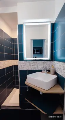 Salle de bains dans l'établissement La nouvelle p'tite Chouette Illuminée 2025